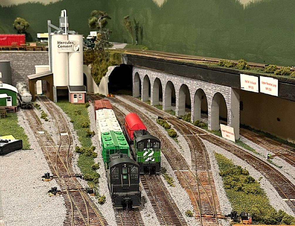 The cement empties have been pulled and spotted for the next eastbound while a loaded butter hopper awaits its pick up here at the yard in Wheeling, WV (Mark Wallace photo)  