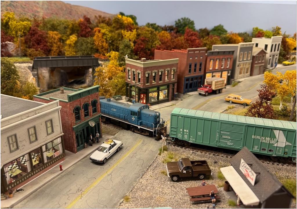 A Boston & Maine local powered by an Alco RS2 passes through the small downtown of Whitefield, New Hampshire (Mike McNamara photo)